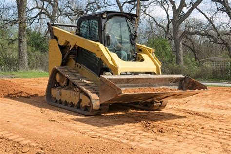 grading land with a mini skid steer|skid steer for yards.